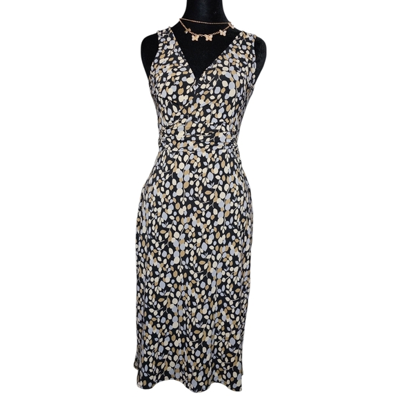 BCBGMaxAzria Dresses & Skirts - BCBGMaxAzria Black and Cream Patterned Midi Dress